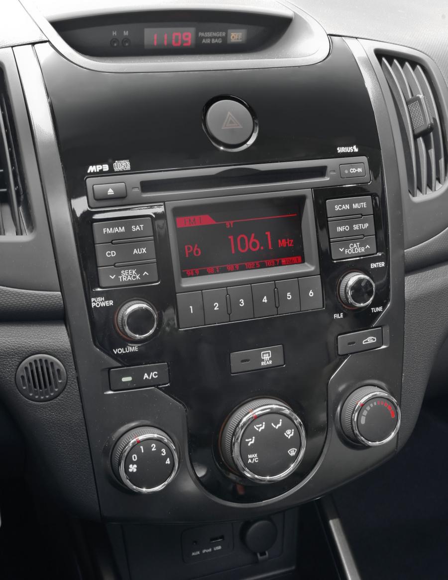  Kia Forte Koup 2009 года  (фото 144 из 169)